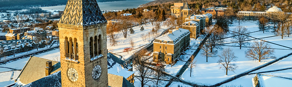 aerial view of Arts Quad and McGraw tower dusted with snow