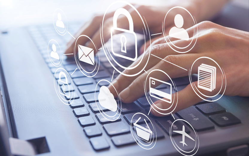 hands on a laptop keyboard; overlaid with security and computing icons