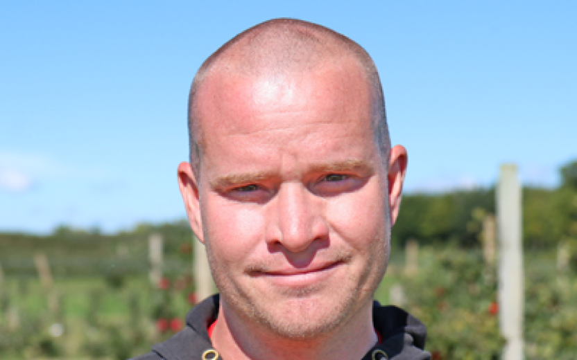 Reece Perrin outdoors in field