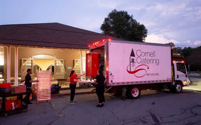 Cornell Catering truck at evening event