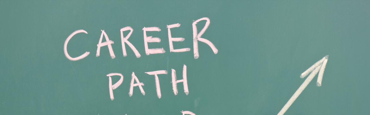 blackboard with "career path ahead" and upward arrow in chalk
